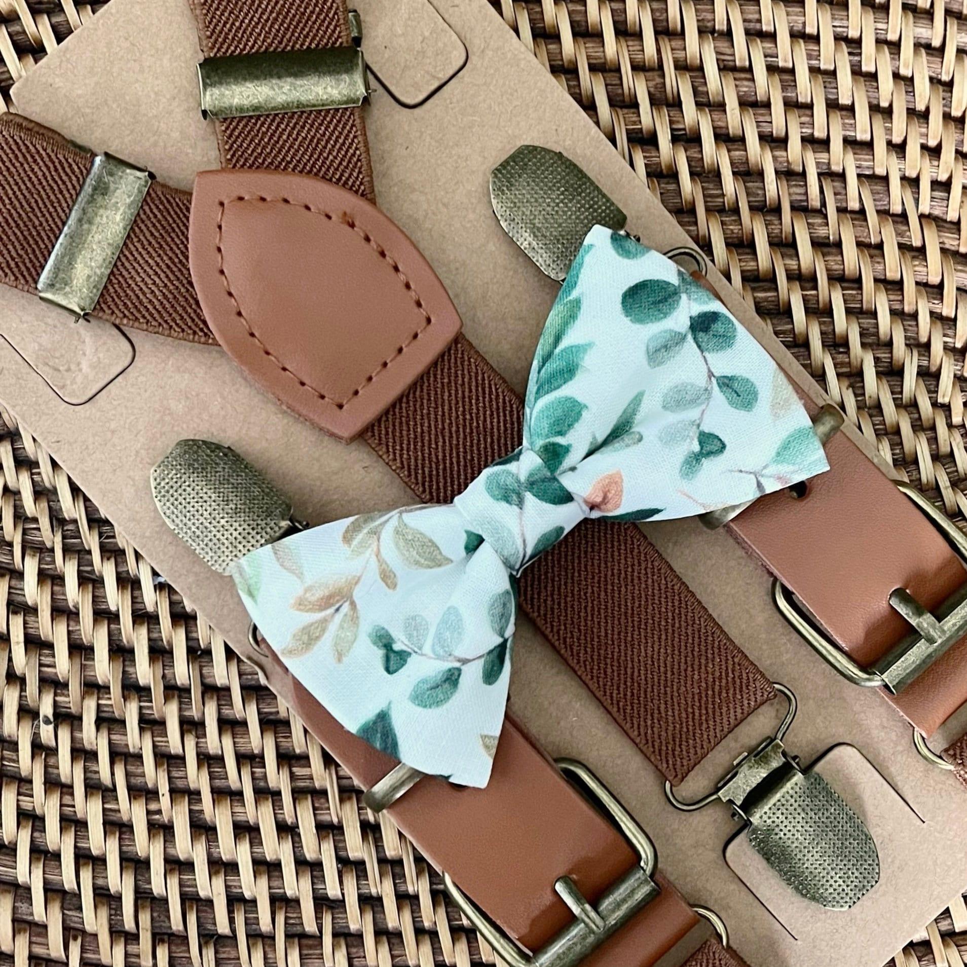 Sage floral bow tie with brown suspenders for groomsmen and ring bearer outfit for a boho wedding.
