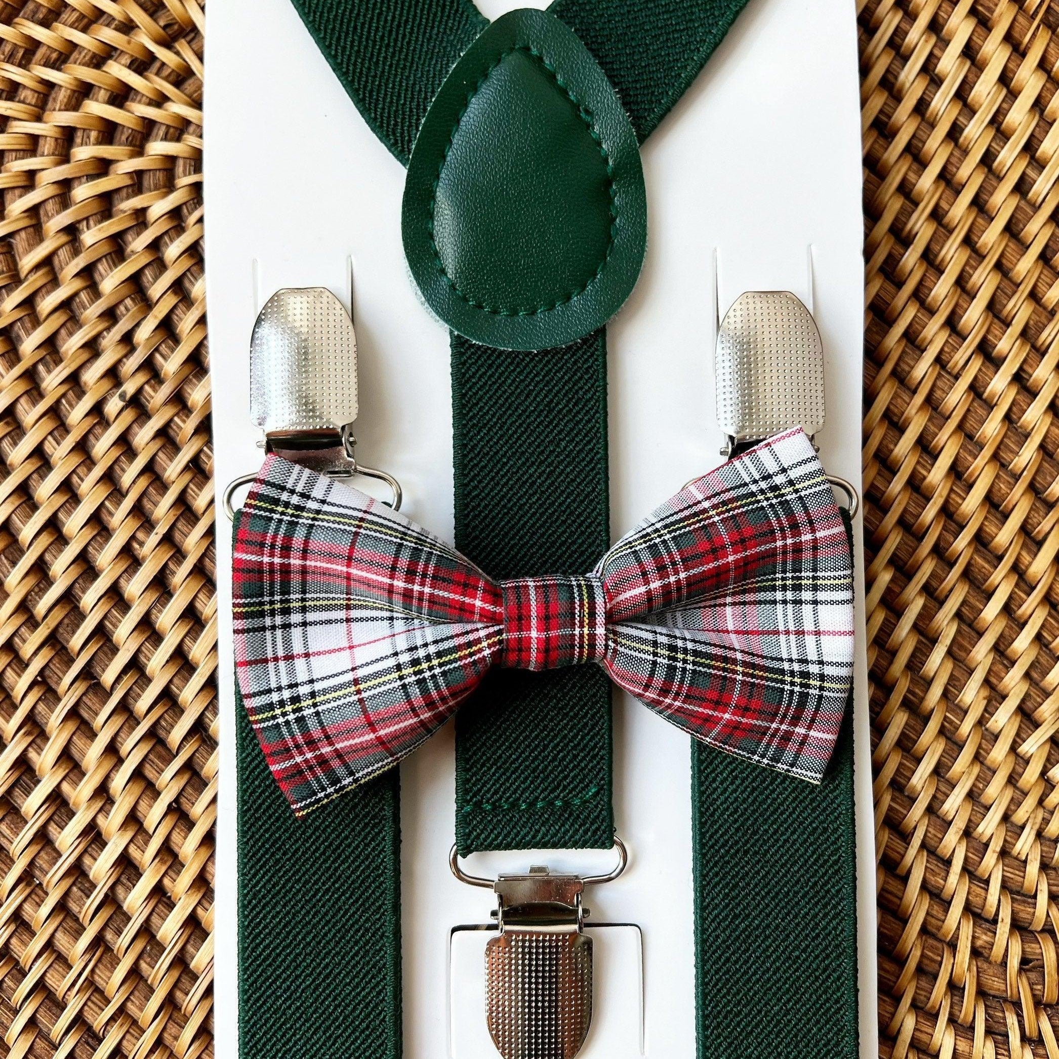 The Bold Bow Tie size chart for bow tie and suspender sets showing Small, Medium, Adult, and Big & Tall sizes with typical age ranges, suspender lengths, and bow tie widths. Small fits ages 6 months–6 years with 18–29 inch suspenders and a 3.5 inch bow tie; Medium fits ages 7–12 years with 25.5–40 inch suspenders and a 4 inch bow tie; Adult fits ages 13 years–6 feet tall with 25.5–40 inch suspenders and a 4.5 inch bow tie; Big & Tall fits over 6 feet tall with 31–53 inch suspenders and a 4.5 inch bow tie.