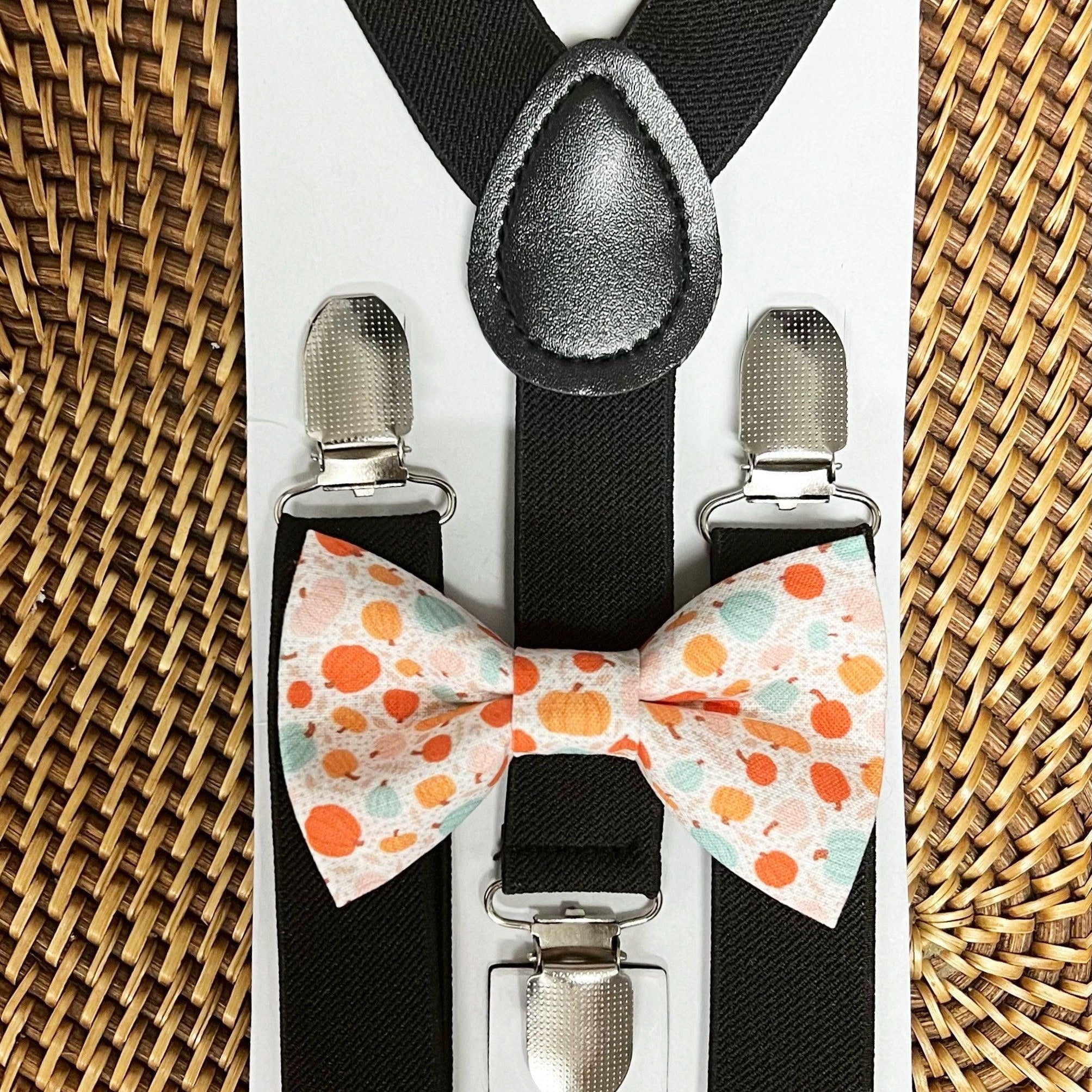 Size chart for suspender and bow tie sets from The Bold Bow Tie. Small (6mo-6yr): 18"-29" suspenders, 3.5" bow. Medium (7-12yr): 25.5"-40" suspenders, 4" bow. Adult (13yr-6ft tall): 25.5"-40" suspenders, 4.5" bow. Big & Tall (Over 6ft tall): 31"-53" suspenders, 4.5" bow. Instructions note to measure from the back waistband over the shoulder to the front waistband for a comfortable fit.