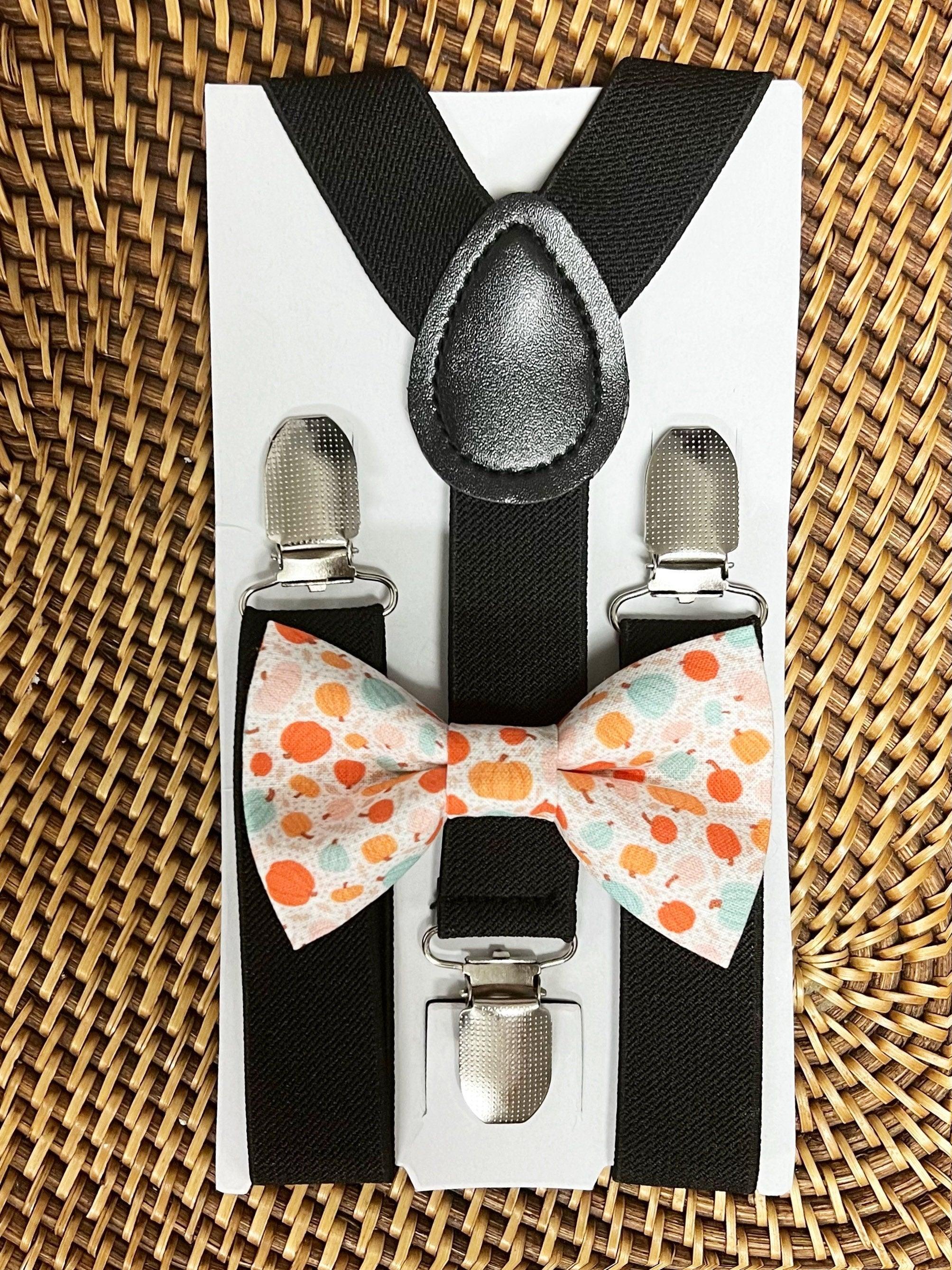 Size chart for suspender and bow tie sets from The Bold Bow Tie. Small (6mo-6yr): 18"-29" suspenders, 3.5" bow. Medium (7-12yr): 25.5"-40" suspenders, 4" bow. Adult (13yr-6ft tall): 25.5"-40" suspenders, 4.5" bow. Big & Tall (Over 6ft tall): 31"-53" suspenders, 4.5" bow. Instructions note to measure from the back waistband over the shoulder to the front waistband for a comfortable fit.