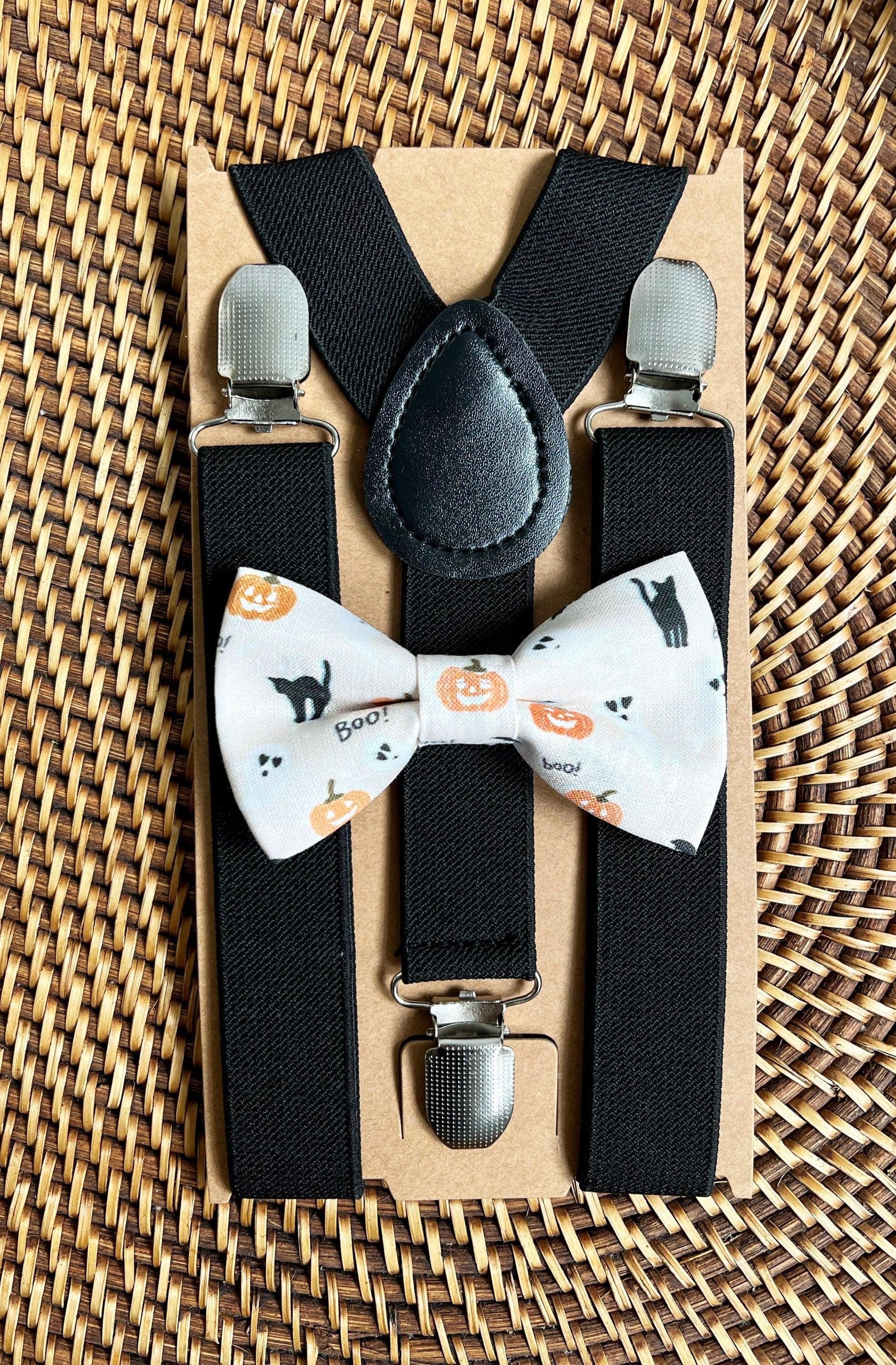 Size chart for suspender and bow tie sets from The Bold Bow Tie. Small (6mo-4yr): 16"-27" suspenders, 3.5" bow. Medium (5-10yr): 20"-32" suspenders, 4" bow. Large (10-18yr): 24"-47" suspenders, 4.5" bow. Adult (Up to 6ft): 27"-55" suspenders, 4.5" bow. Big & Tall (Over 6ft): Up to 63" suspenders, 4.5" bow. Instructions note to measure from the back waistband over the shoulder to the front waistband for a comfortable fit.