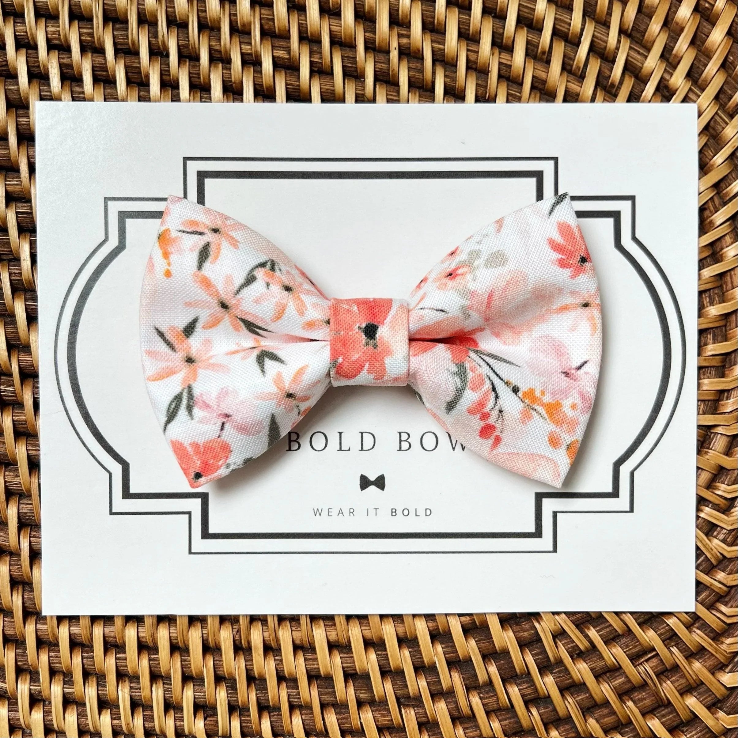 Dog bow tie size chart. Size Small is 3 1/2 inches wide for small dogs under 15 lbs. Size Medium is 4 inches wide for medium dogs between 15 band 40 lbs. Size Large is 4 1/2 inches wide for Large Dogs between 40 band 80 lbs. Size Extra Large is 5 1/2 inches wide for Extra Large Dogs over 80 lbs. Sizing is up to preference and pet bow ties slide on to dog collars with elastic.