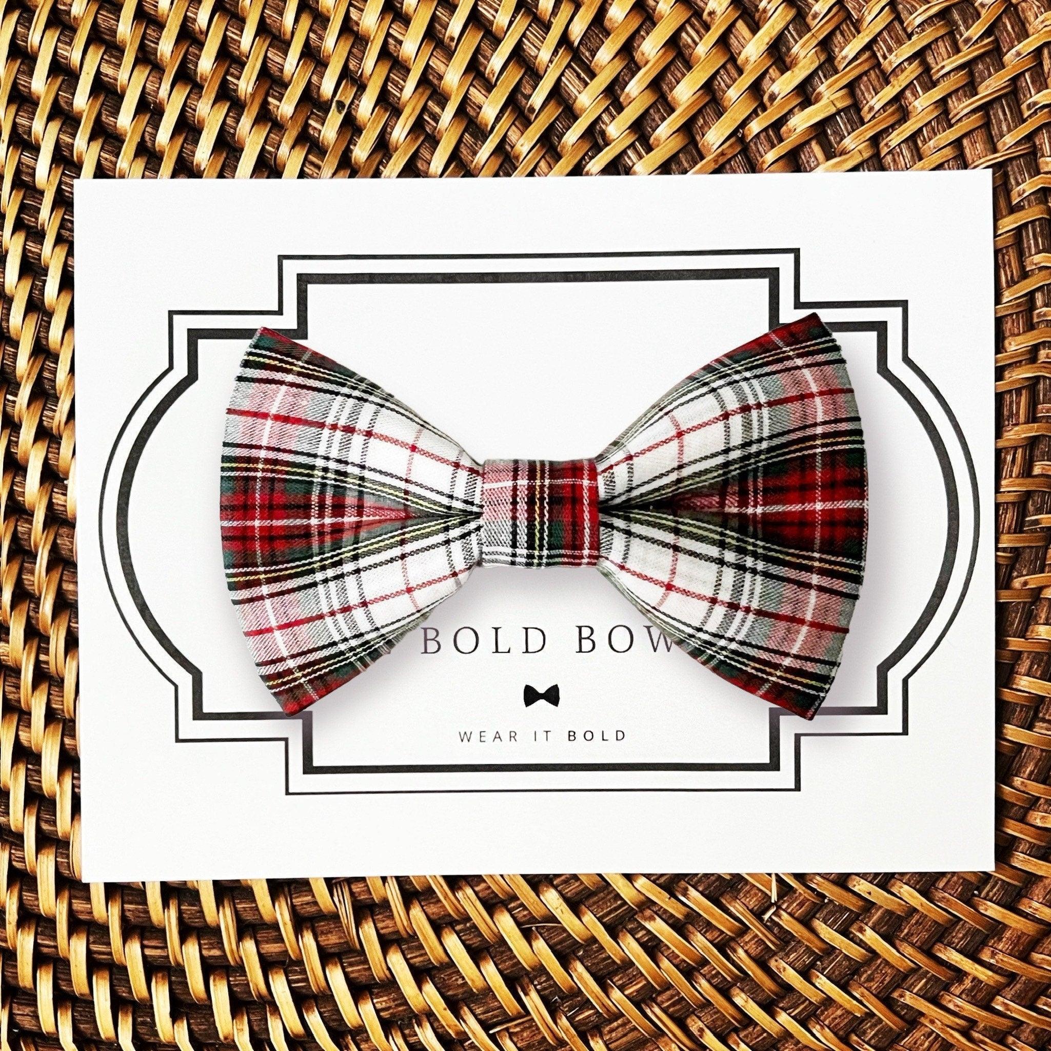 Dog bow tie size chart. Size Small is 3 1/2 inches wide for small dogs under 15 lbs. Size Medium is 4 inches wide for medium dogs between 15 band 40 lbs. Size Large is 4 1/2 inches wide for Large Dogs between 40 band 80 lbs. Size Extra Large is 5 1/2 inches wide for Extra Large Dogs over 80 lbs. Sizing is up to preference and pet bow ties slide on to dog collars with elastic.