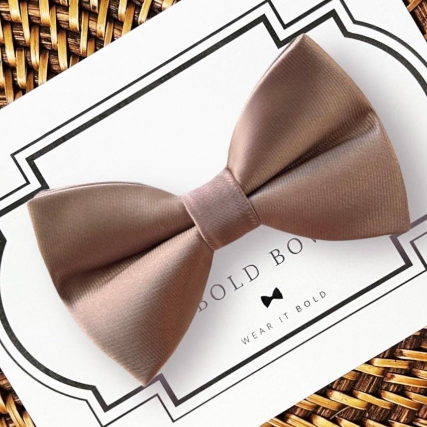 Bow Size Chart: Large: 4 1/2 inches wide by 2 1/2 inches tall Medium: 4 inches wide by 2 1/2 inches tall Small: 3 inches wide by 2 inches tall