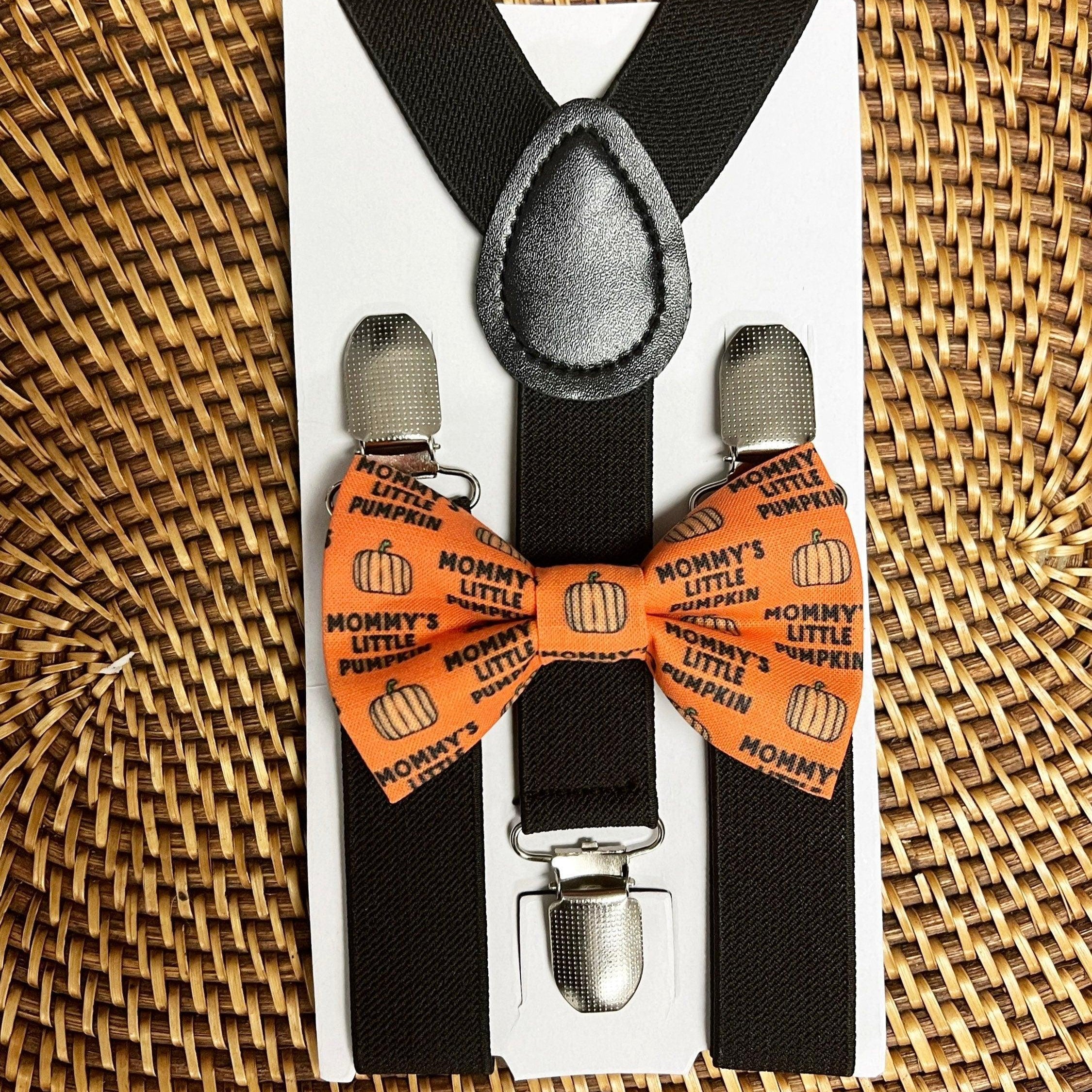 The Bold Bow Tie size chart for bow tie and suspender sets showing Small, Medium, Adult, and Big & Tall sizes with typical age ranges, suspender lengths, and bow tie widths. Small fits ages 6 months–6 years with 18–29 inch suspenders and a 3.5 inch bow tie; Medium fits ages 7–12 years with 25.5–40 inch suspenders and a 4 inch bow tie; Adult fits ages 13 years–6 feet tall with 25.5–40 inch suspenders and a 4.5 inch bow tie; Big & Tall fits over 6 feet tall with 31–53 inch suspenders and a 4.5 inch bow tie.