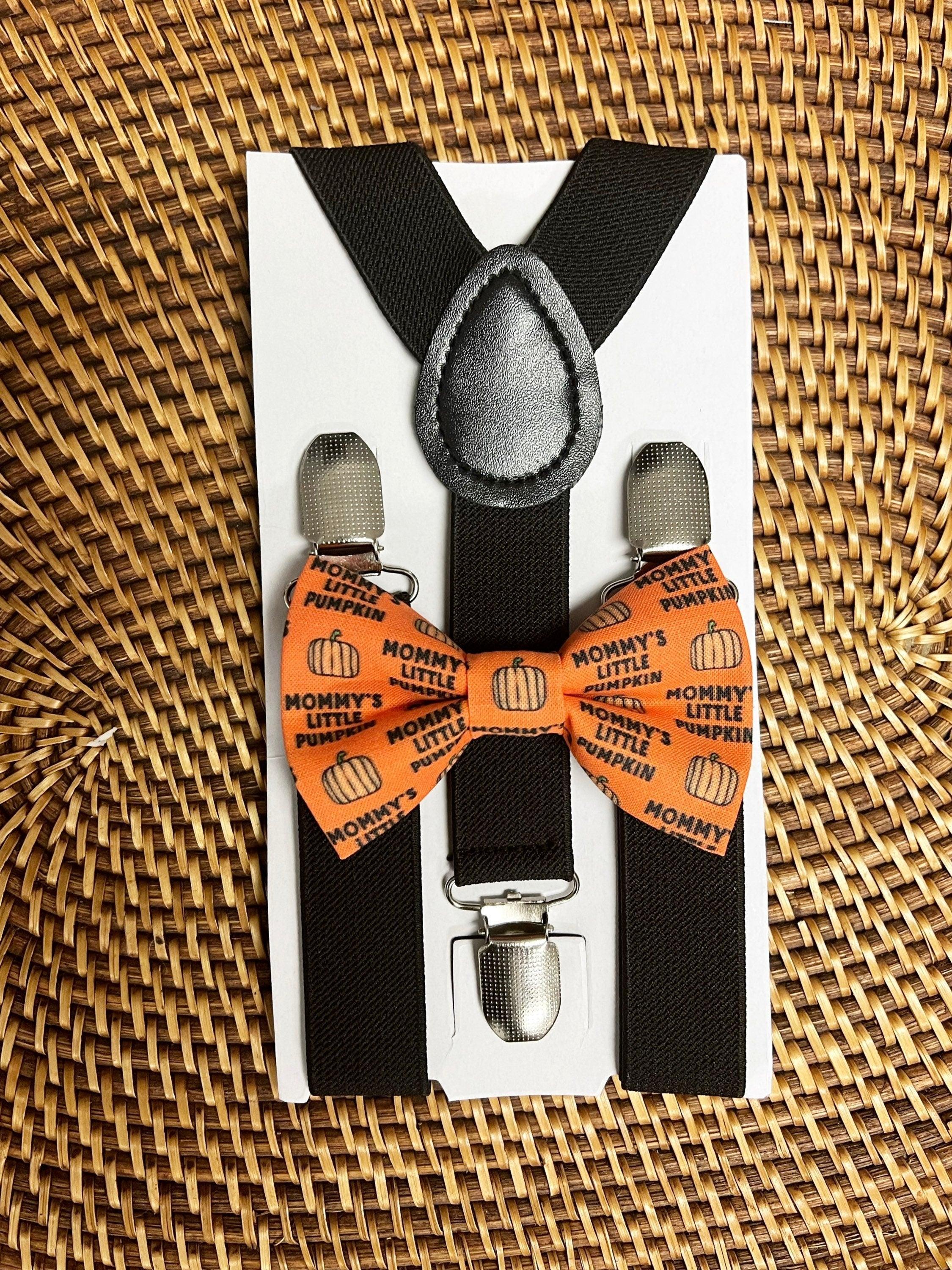 The Bold Bow Tie size chart for bow tie and suspender sets showing Small, Medium, Adult, and Big & Tall sizes with typical age ranges, suspender lengths, and bow tie widths. Small fits ages 6 months–6 years with 18–29 inch suspenders and a 3.5 inch bow tie; Medium fits ages 7–12 years with 25.5–40 inch suspenders and a 4 inch bow tie; Adult fits ages 13 years–6 feet tall with 25.5–40 inch suspenders and a 4.5 inch bow tie; Big & Tall fits over 6 feet tall with 31–53 inch suspenders and a 4.5 inch bow tie.