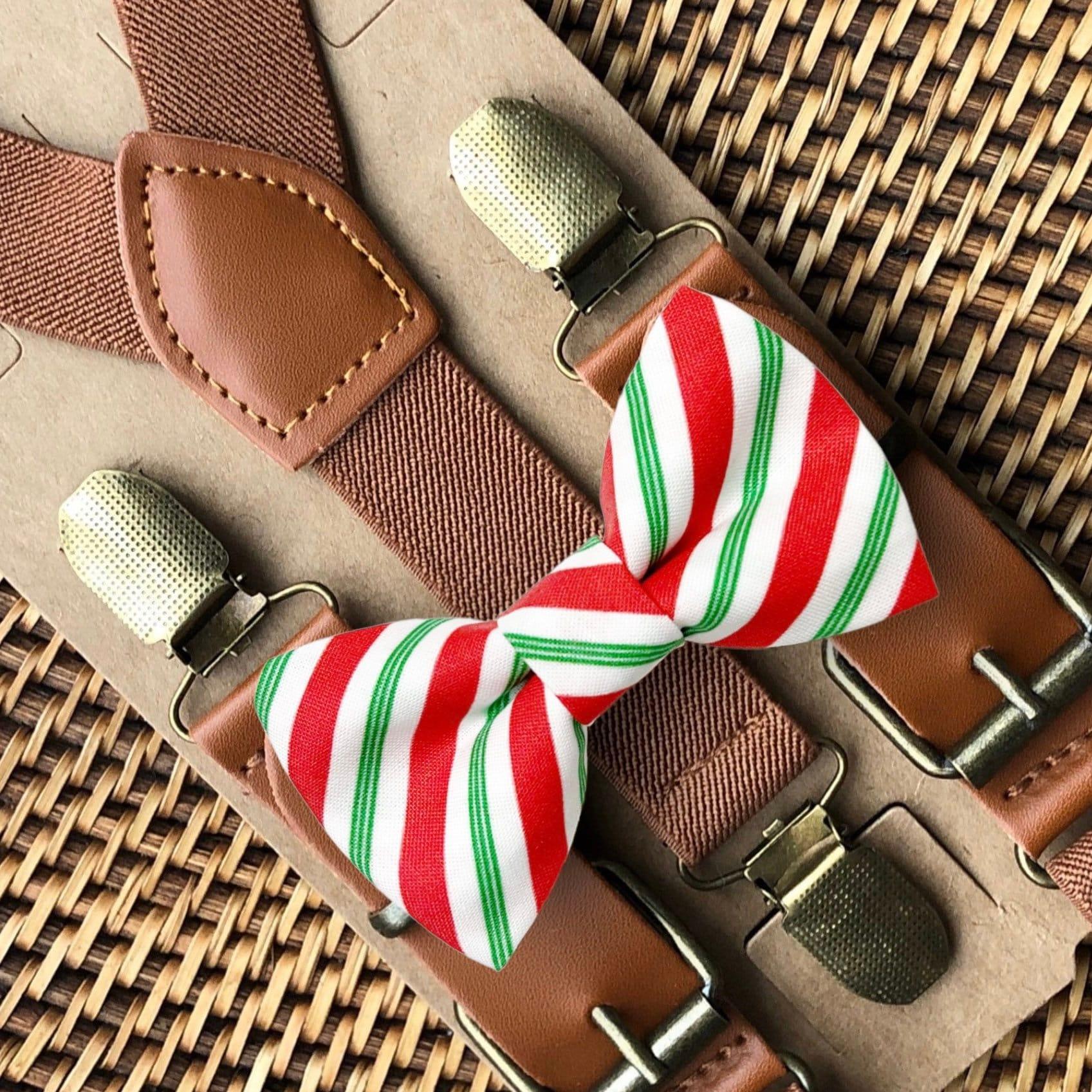 Christmas bow tie with red and green stripes and brown suspenders.