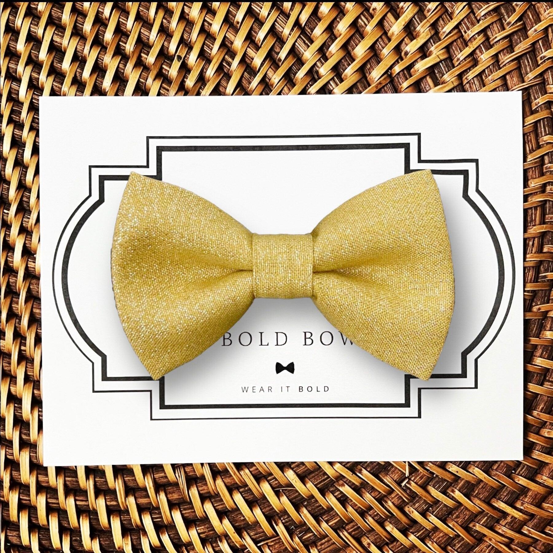 Dog bow tie size chart. Size Small is 3 1/2 inches wide for small dogs under 15 lbs. Size Medium is 4 inches wide for medium dogs between 15 band 40 lbs. Size Large is 4 1/2 inches wide for Large Dogs between 40 band 80 lbs. Size Extra Large is 5 1/2 inches wide for Extra Large Dogs over 80 lbs. Sizing is up to preference and pet bow ties slide on to dog collars with elastic.