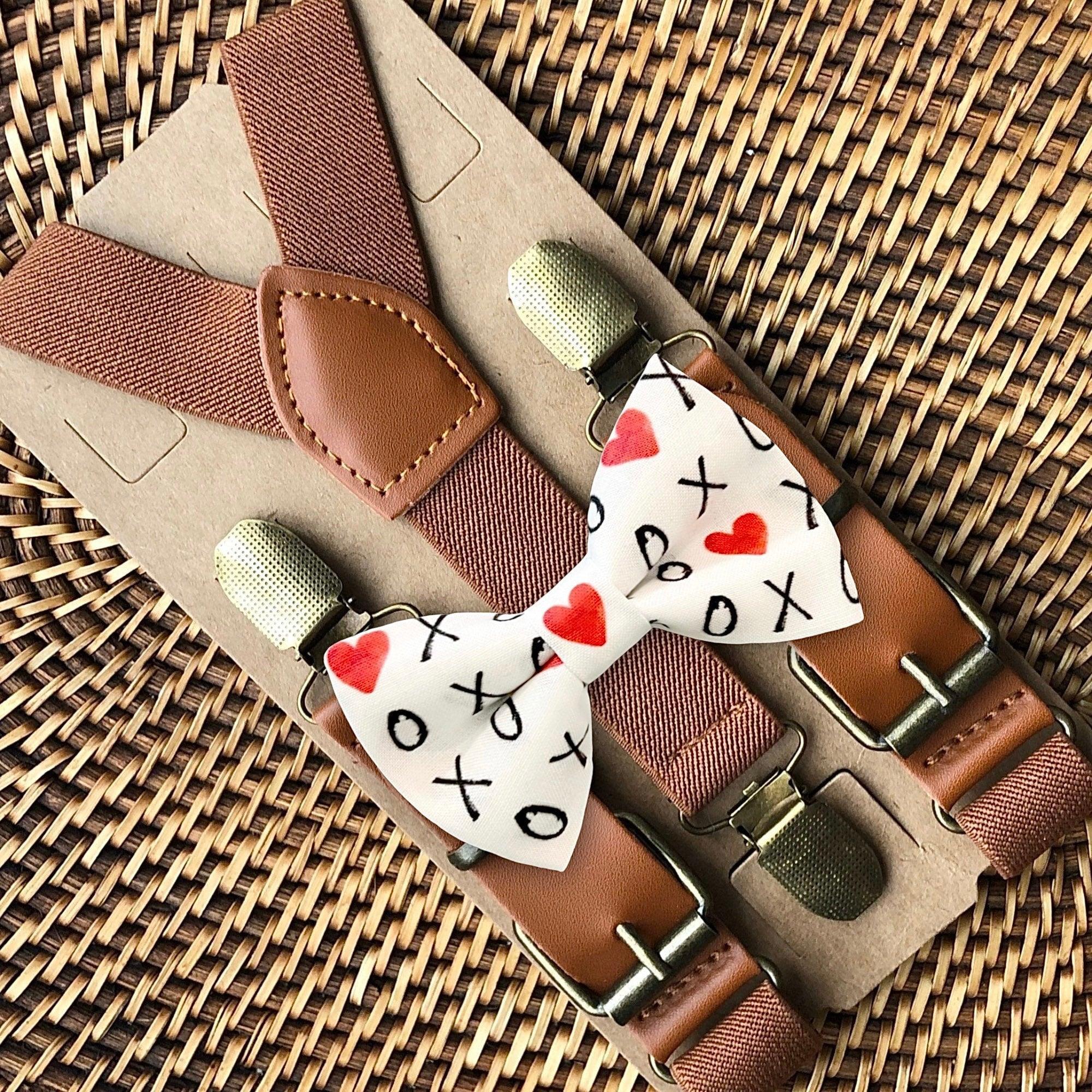 Size chart for suspender and bow tie sets from The Bold Bow Tie. X-Small (6mo-4yr): 15"-23" suspenders, 3.5" bow. Small (5-9yr): 18"-33" suspenders, 3.5" bow. Medium (10-12yr): 18"-33" suspenders, 4" bow. Adult (13yr-6'5"): 30"-53" suspenders, 4.5" bow. Big & Tall (Over 6'5"): 53"+ suspenders, 4.5" bow. Instructions note to measure from the back waistband over the shoulder to the front waistband for a comfortable fit.
