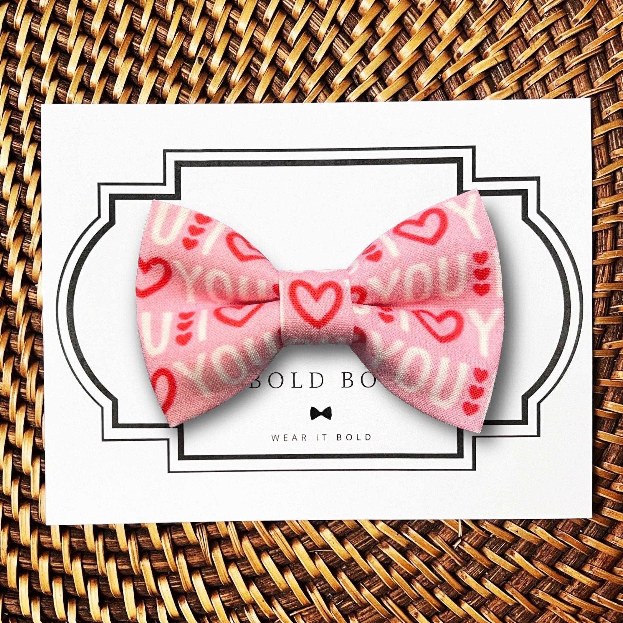 Dog bow tie size chart. Size Small is 3 1/2 inches wide for small dogs under 15 lbs. Size Medium is 4 inches wide for medium dogs between 15 band 40 lbs. Size Large is 4 1/2 inches wide for Large Dogs between 40 band 80 lbs. Size Extra Large is 5 1/2 inches wide for Extra Large Dogs over 80 lbs. Sizing is up to preference and pet bow ties slide on to dog collars with elastic.