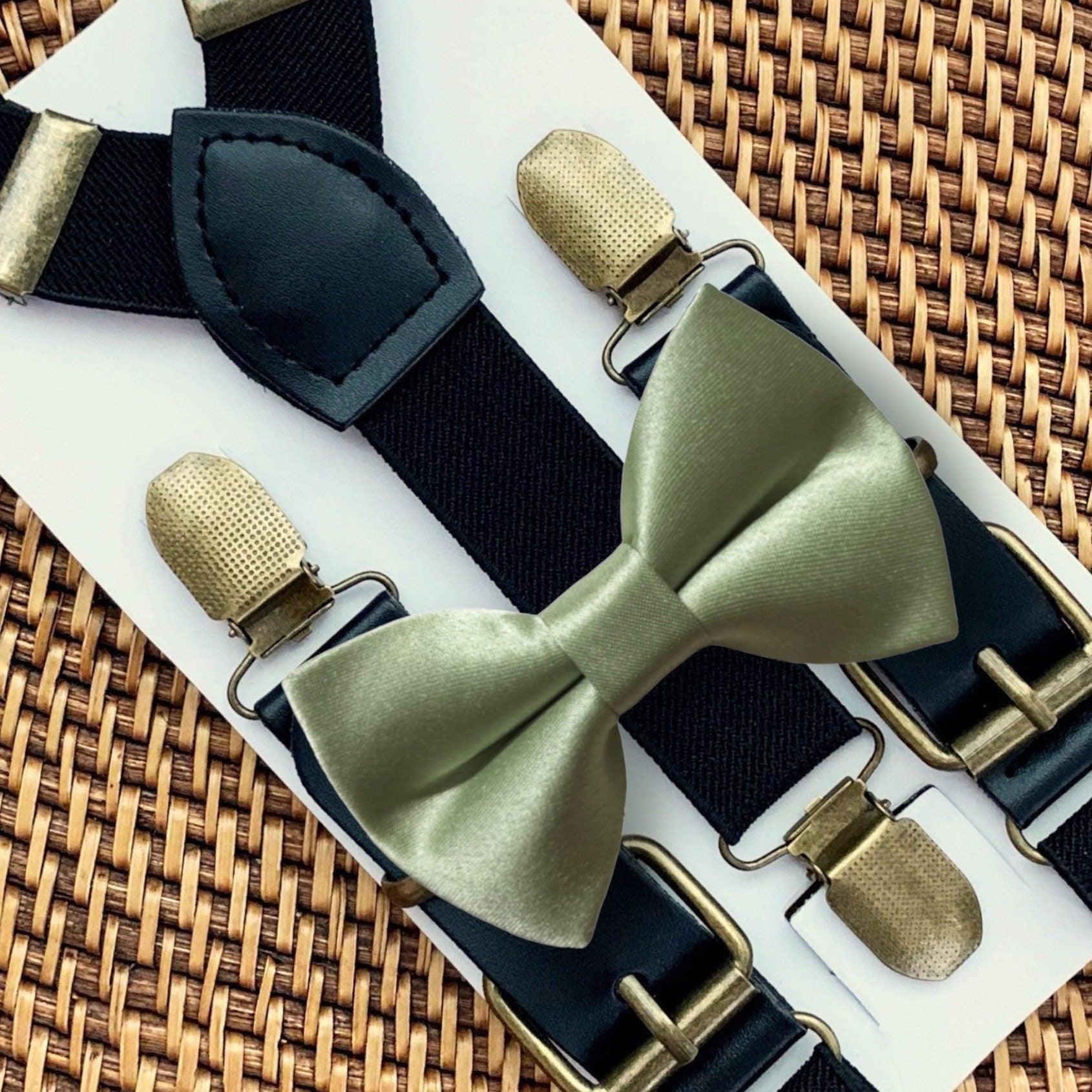 Size chart for suspender and bow tie sets from The Bold Bow Tie. X-Small (6mo-4yr): 15"-23" suspenders, 3.5" bow. Small (5-9yr): 18"-33" suspenders, 3.5" bow. Medium (10-12yr): 18"-33" suspenders, 4" bow. Adult (13yr-6'5"): 30"-53" suspenders, 4.5" bow. Big & Tall (Over 6'5"): 53"+ suspenders, 4.5" bow. Instructions note to measure from the back waistband over the shoulder to the front waistband for a comfortable fit.