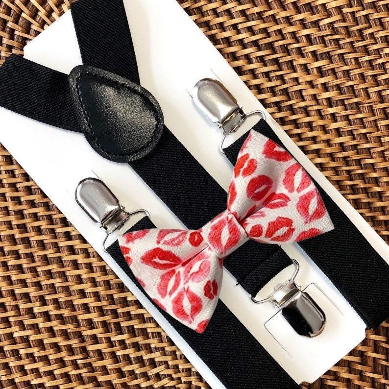 Valentine's Day bow tie with lips and black suspenders.