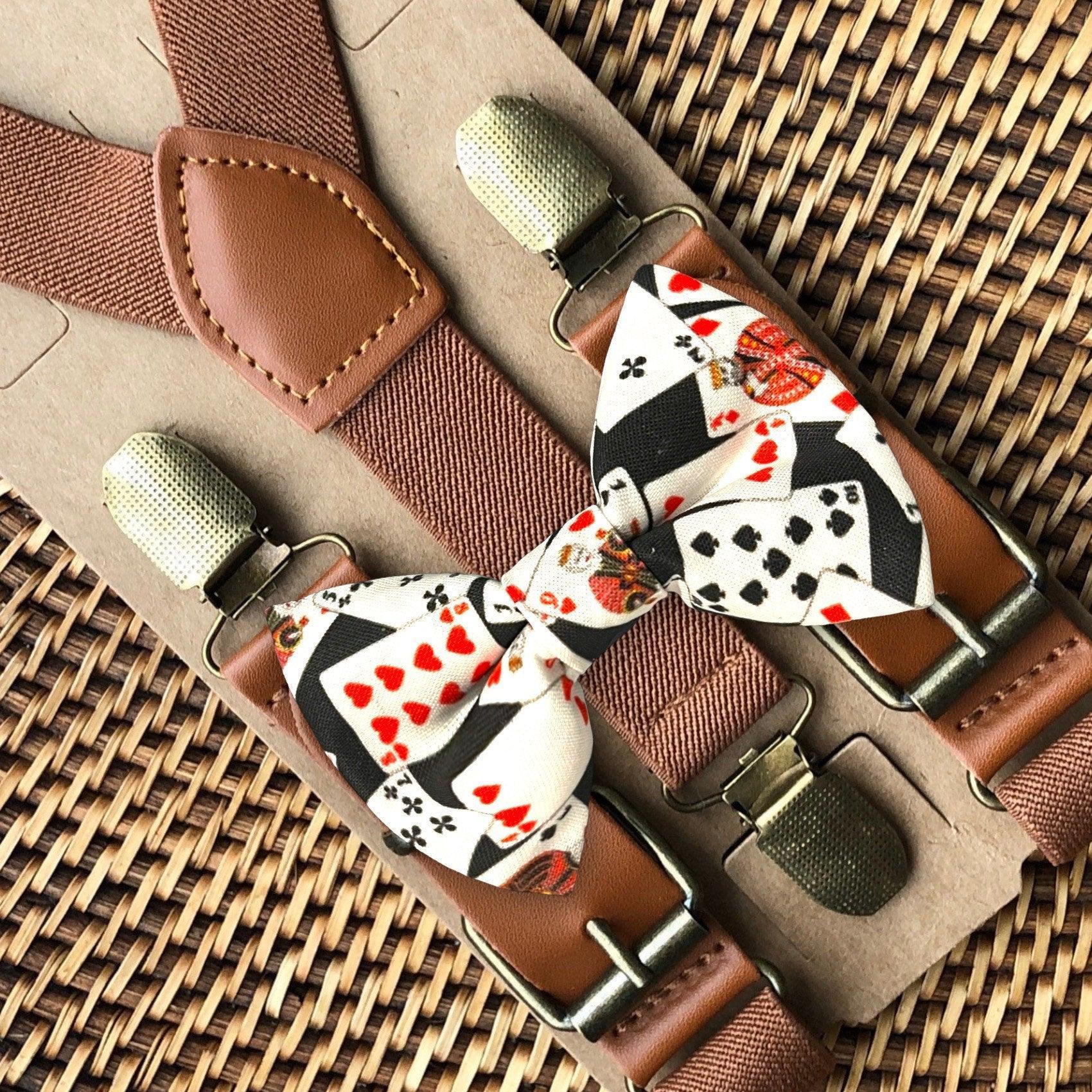 Size chart for suspender and bow tie sets from The Bold Bow Tie. X-Small (6mo-4yr): 15"-23" suspenders, 3.5" bow. Small (5-9yr): 18"-33" suspenders, 3.5" bow. Medium (10-12yr): 18"-33" suspenders, 4" bow. Adult (13yr-6'5"): 30"-53" suspenders, 4.5" bow. Big & Tall (Over 6'5"): 53"+ suspenders, 4.5" bow. Instructions note to measure from the back waistband over the shoulder to the front waistband for a comfortable fit.