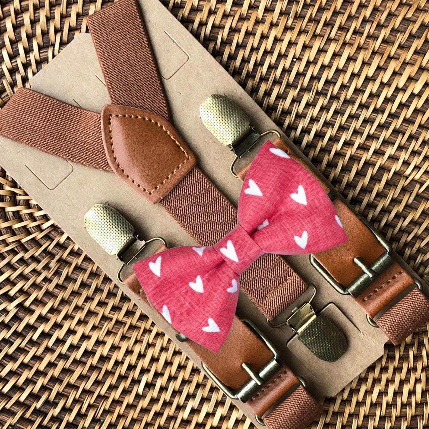 Size chart for suspender and bow tie sets from The Bold Bow Tie. X-Small (6mo-4yr): 15"-23" suspenders, 3.5" bow. Small (5-9yr): 18"-33" suspenders, 3.5" bow. Medium (10-12yr): 18"-33" suspenders, 4" bow. Adult (13yr-6'5"): 30"-53" suspenders, 4.5" bow. Big & Tall (Over 6'5"): 53"+ suspenders, 4.5" bow. Instructions note to measure from the back waistband over the shoulder to the front waistband for a comfortable fit.