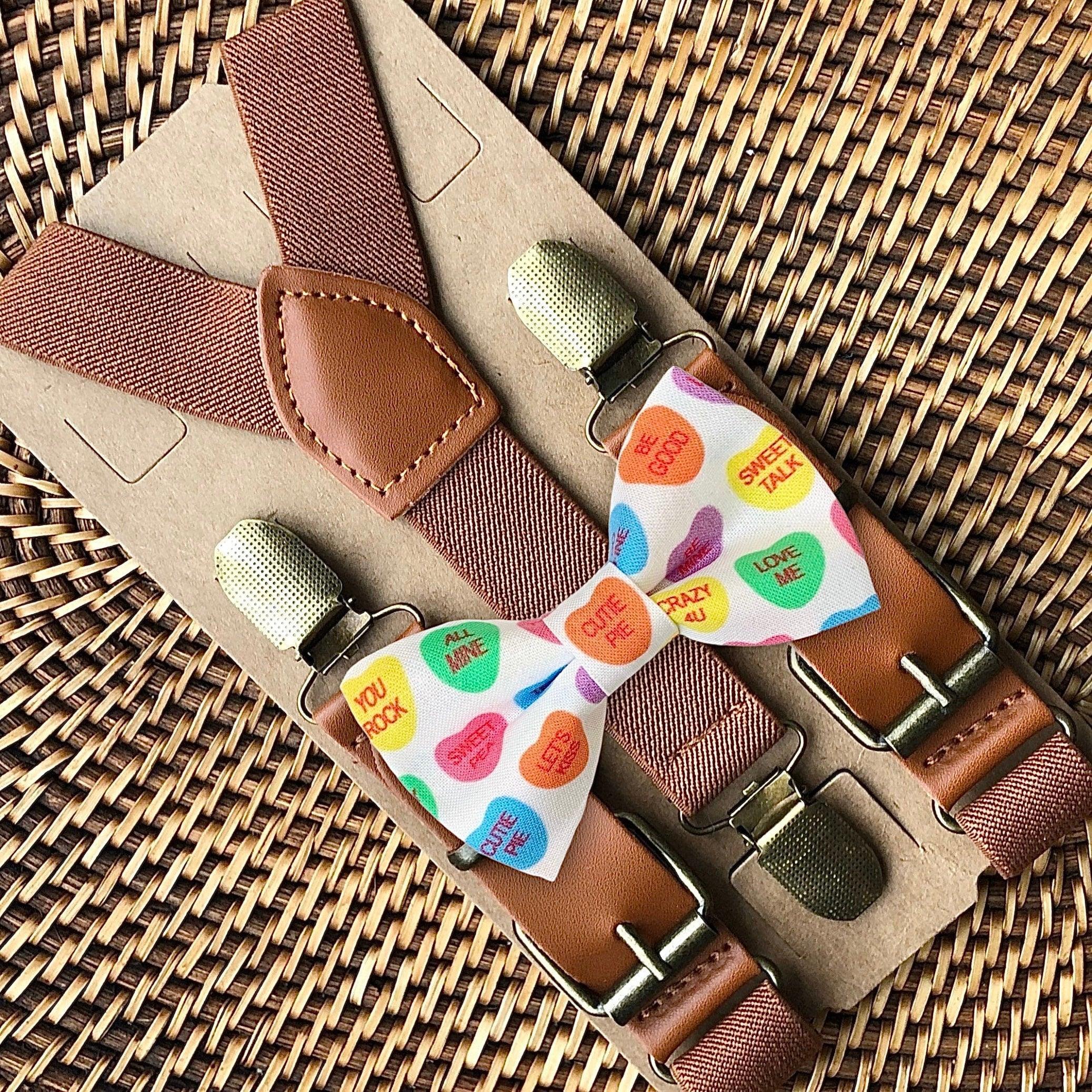 Size chart for suspender and bow tie sets from The Bold Bow Tie. X-Small (6mo-4yr): 15"-23" suspenders, 3.5" bow. Small (5-9yr): 18"-33" suspenders, 3.5" bow. Medium (10-12yr): 18"-33" suspenders, 4" bow. Adult (13yr-6'5"): 30"-53" suspenders, 4.5" bow. Big & Tall (Over 6'5"): 53"+ suspenders, 4.5" bow. Instructions note to measure from the back waistband over the shoulder to the front waistband for a comfortable fit.
