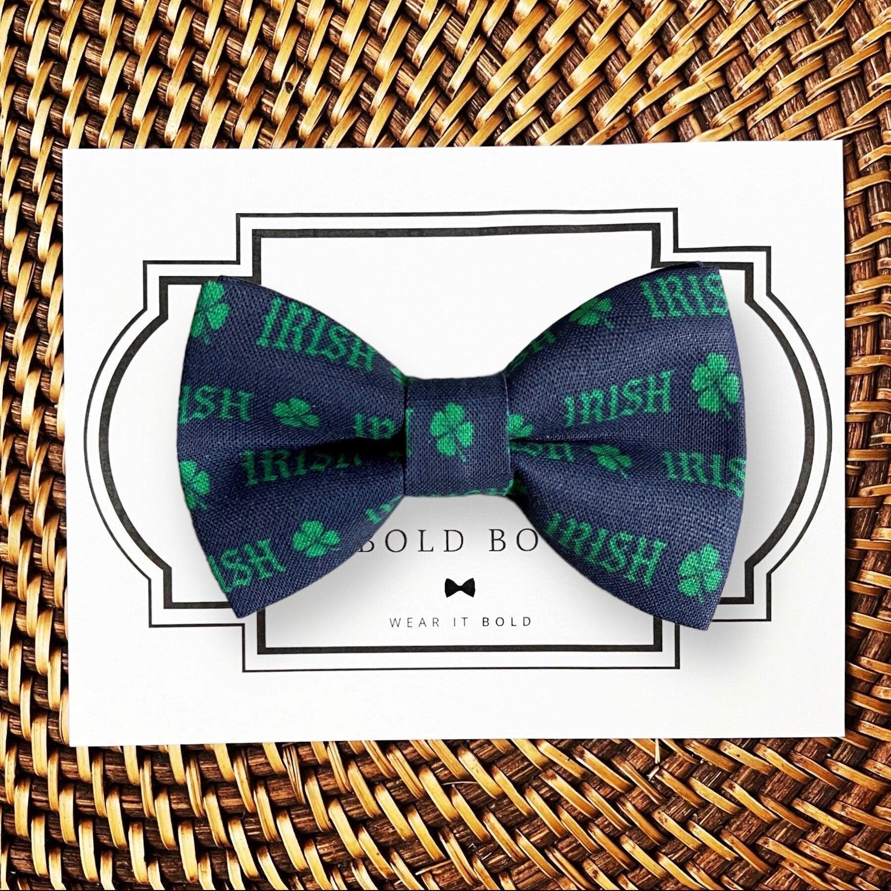 Dog bow tie size chart. Size Small is 3 1/2 inches wide for small dogs under 15 lbs. Size Medium is 4 inches wide for medium dogs between 15 band 40 lbs. Size Large is 4 1/2 inches wide for Large Dogs between 40 band 80 lbs. Size Extra Large is 5 1/2 inches wide for Extra Large Dogs over 80 lbs. Sizing is up to preference and pet bow ties slide on to dog collars with elastic.