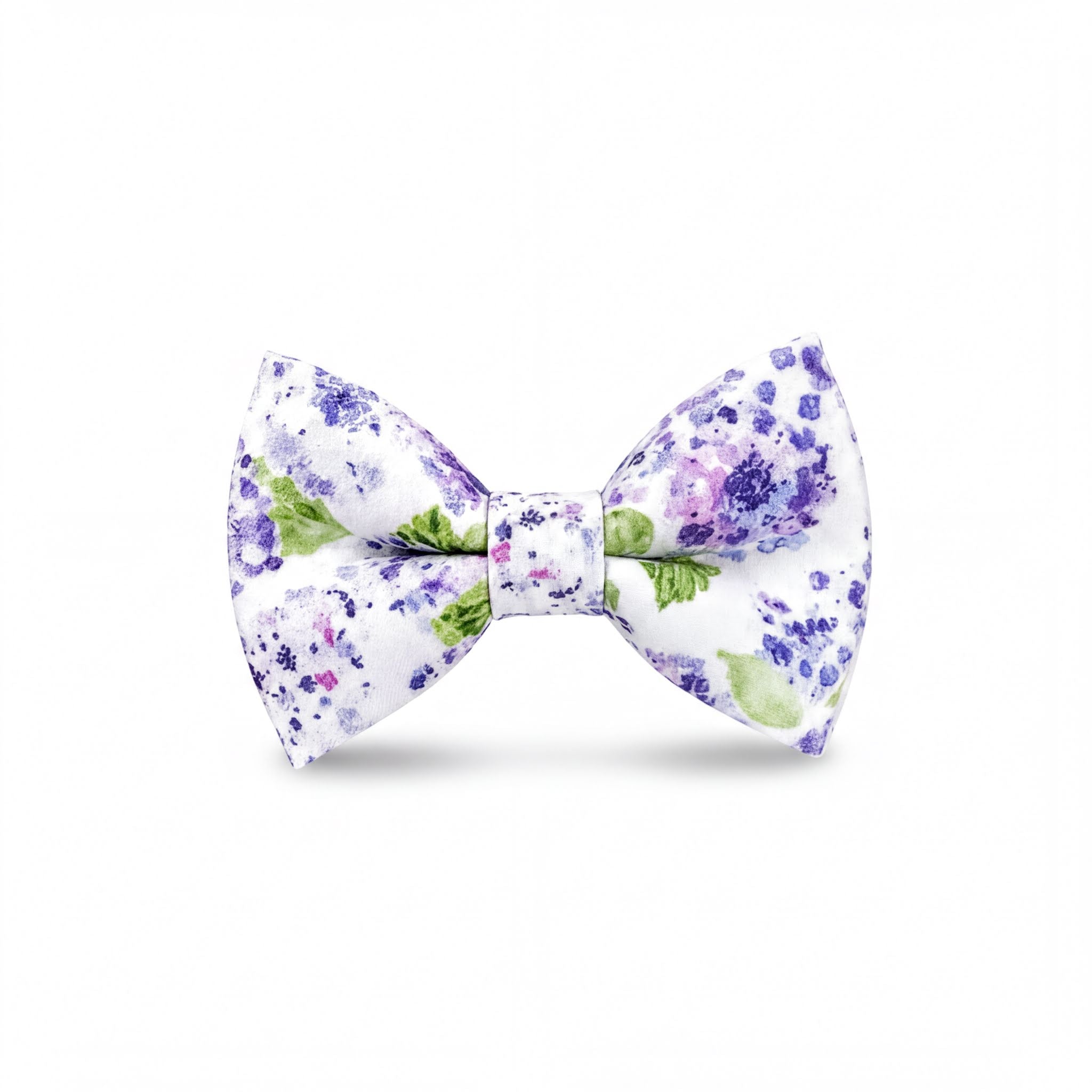 A bow tie with a floral print in shades of purple and green.