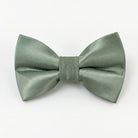 A Sage bow tie pre-tied in a muted green color with a subtle satin sheen, presented on a clean white background.