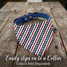 American flag dog bandana on a wooden surface with text indicating it slips onto a collar.