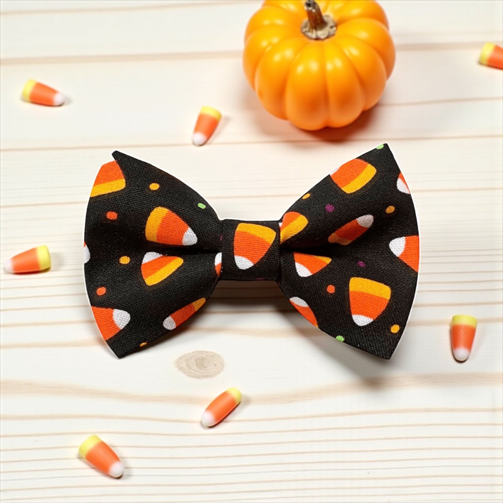Candy Corn Bow Tie- Halloween Bowtie surrounded by candy corn candy and pumpkin 