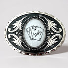 Decorative Cowboy cards belt buckle with playing card design on a gray background