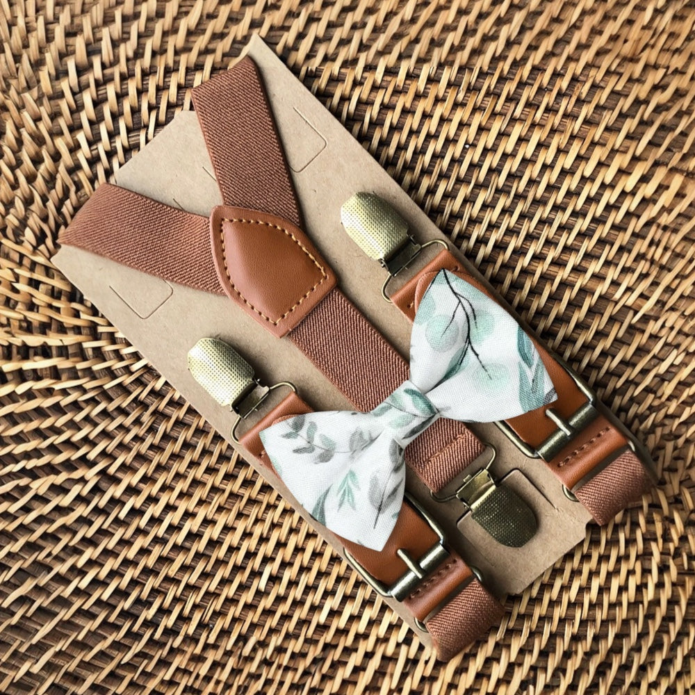 Size chart for suspender and bow tie sets from The Bold Bow Tie. X-Small (6mo-4yr): 15"-23" suspenders, 3.5" bow. Small (5-9yr): 18"-33" suspenders, 3.5" bow. Medium (10-12yr): 18"-33" suspenders, 4" bow. Adult (13yr-6'5"): 30"-53" suspenders, 4.5" bow. Big & Tall (Over 6'5"): 53"+ suspenders, 4.5" bow. Instructions note to measure from the back waistband over the shoulder to the front waistband for a comfortable fit.