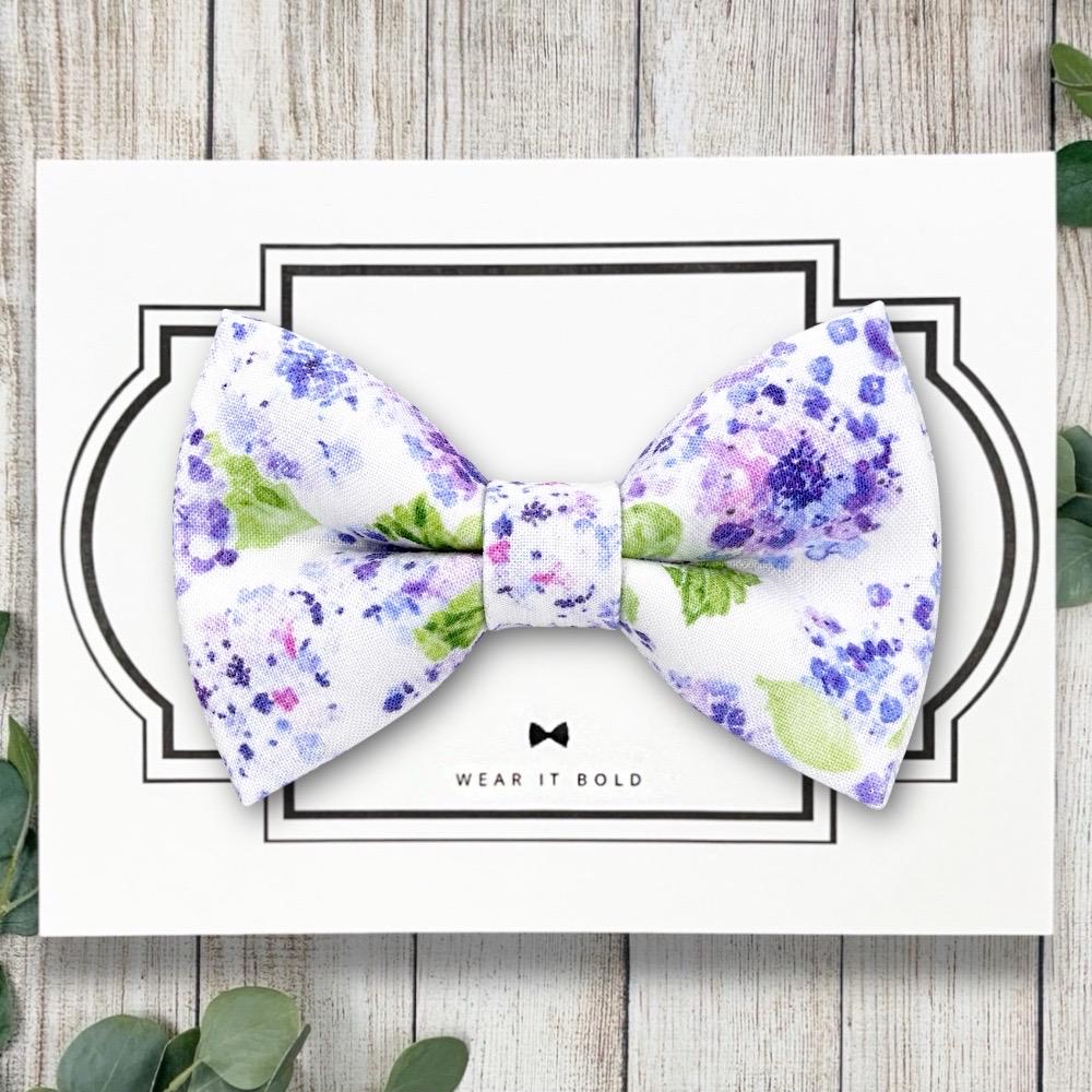 Handmade purple floral dog bowtie and cat bow tie designed as a pet collar accessory for weddings, gifts, and photos.