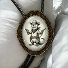 Otter bolo tie with genuine leather cord.