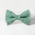 Sage green floral bow tie for boys, groomsmen and men on a white background
