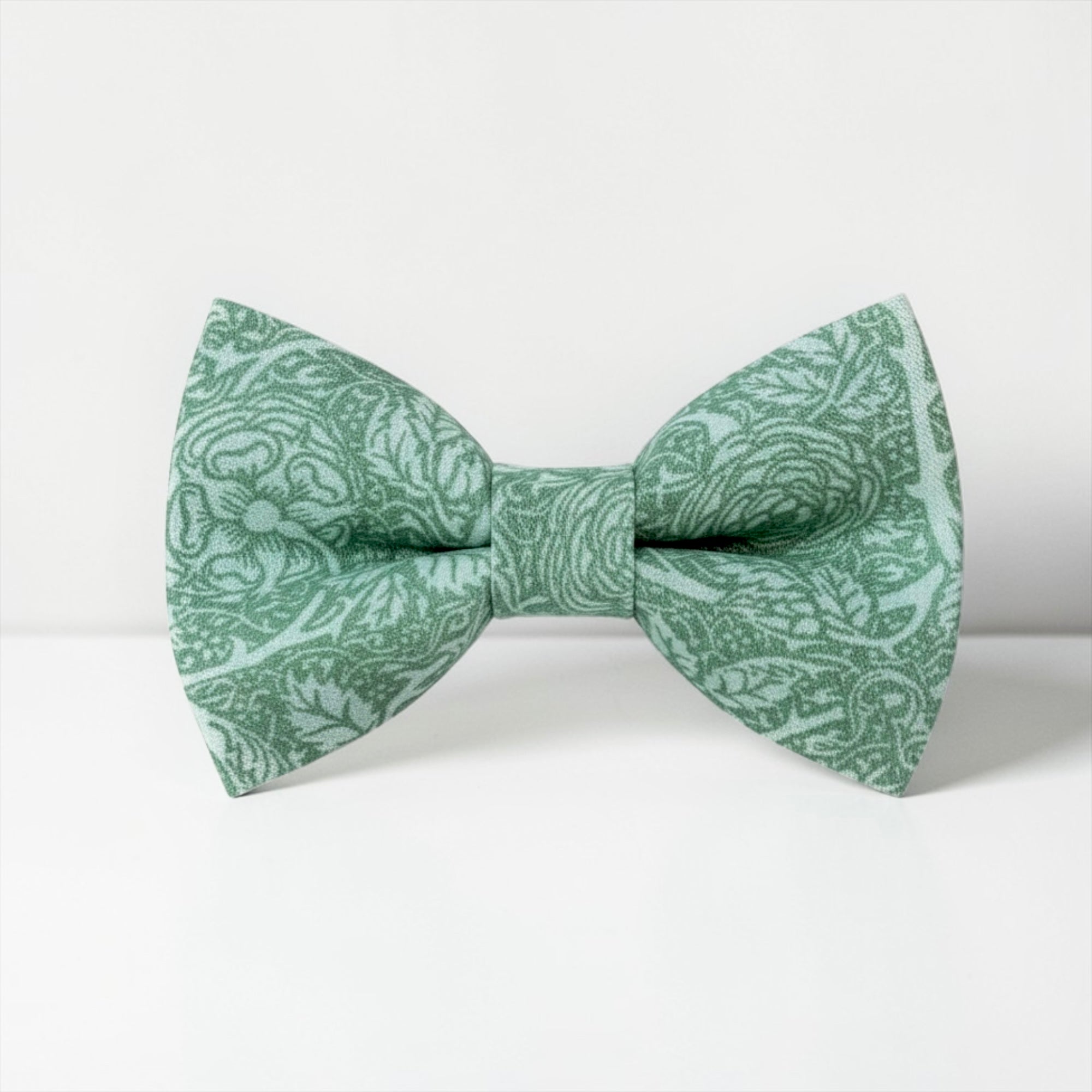 Sage green floral bow tie for boys, groomsmen and men on a white background