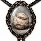 A baseball bolero tie is displayed in a decorative oval frame, which is part of a necklace or accessory.