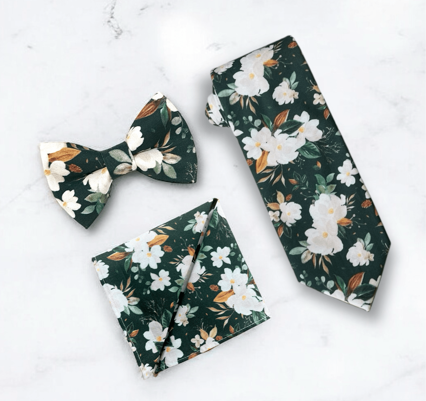 Emerald green floral men’s tie, bow tie and pocket square for wedding or special event.