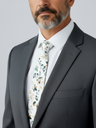Man wearing Sage floral tie for men as a groomsman in a wedding. 