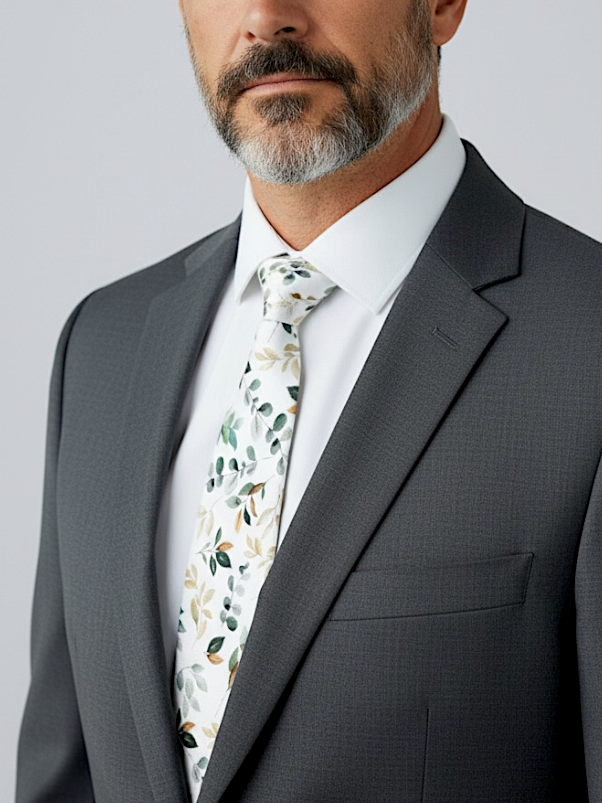 Man wearing Sage floral tie for men as a groomsman in a wedding. 