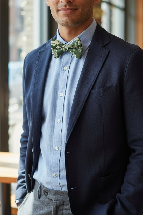 Olive floral bow tie for groomsmen being worn by a groomsman in a wedding.