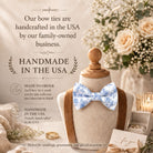 The image is an advertisement for handmade bow ties, featuring a mannequin wearing a blue and white floral bow tie, surrounded by wedding decorations and flowers.