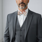 Terracotta floral bowtie for men, groomsmen and ring bearers.