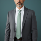 Groomsman wearing a Dusty Sage necktie for a wedding.