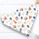 Fourth of July Dog Bandana for Independence Day in red white and blue flags, paw prints and patriotic hats.