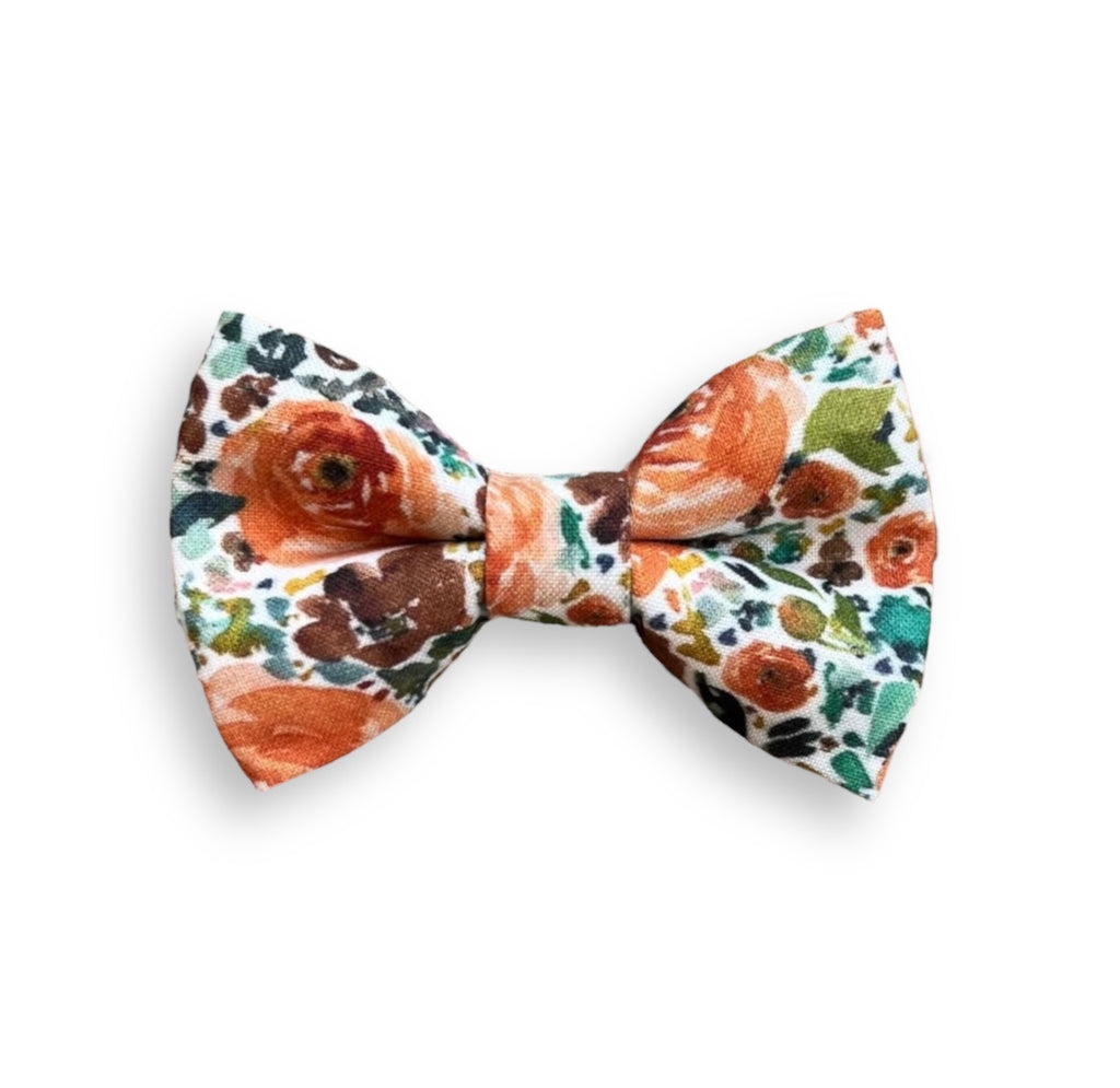 a bow tie with a flower pattern on it