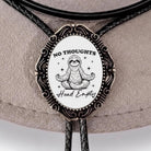 Funny bolo tie with "NO THOUGHTS Head Empty" on it.