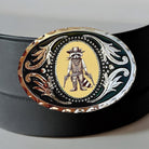 Belt with a decorative buckle featuring a raccoon in a cowboy hat and boots on a gray background