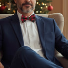 Red Plaid Christmas Bow Tie – Holiday Tartan for Men At a Christmas party.