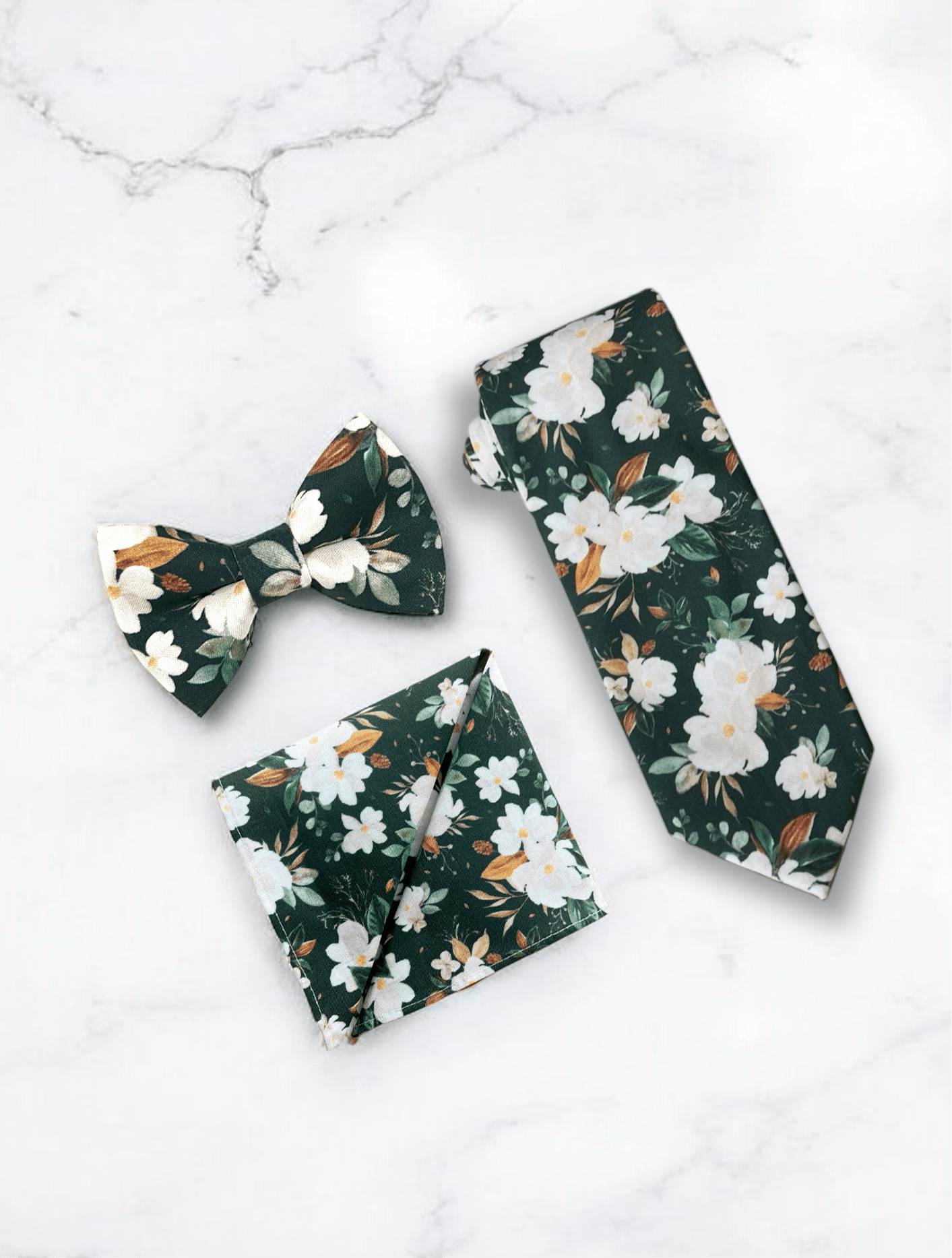Emerald green floral men’s tie, bow tie and pocket square for wedding or special event.