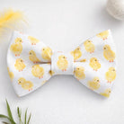 Close-up of a handmade Easter Bow Tie with Yellow Chicks featuring a whimsical baby chick pattern on a white background, styled as a Yellow Toddler Bowtie for Boys for Easter Sunday outfits.