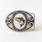 A decorative metal buckle with a fish image on it.