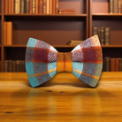 Fall Plaid Bow Tie - Orange and Blue Tartan in a library 