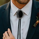 Black Onyx Bolo Tie for men on a groomsman in a wedding.