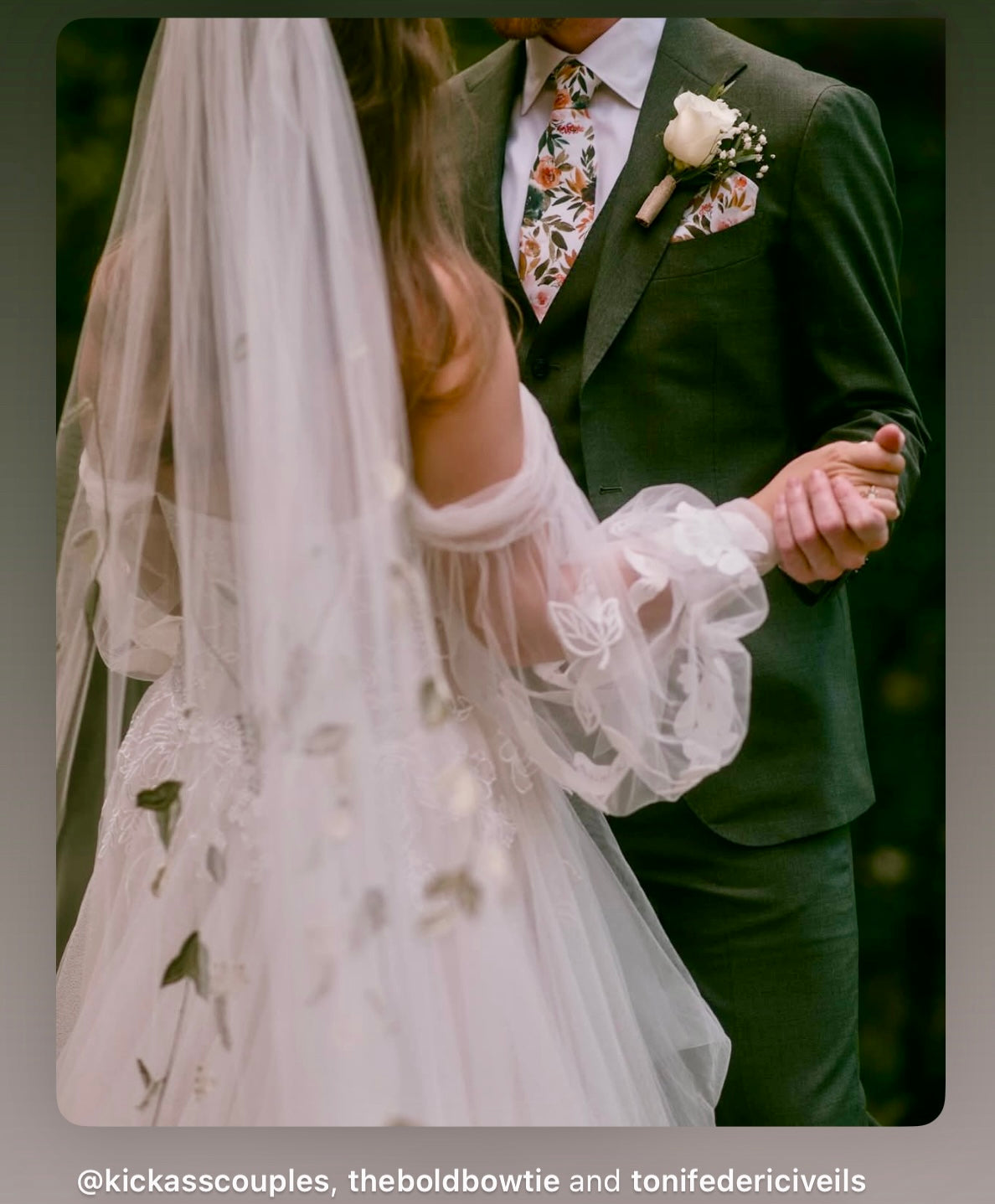 Bride and groom in floral tie for a wedding.