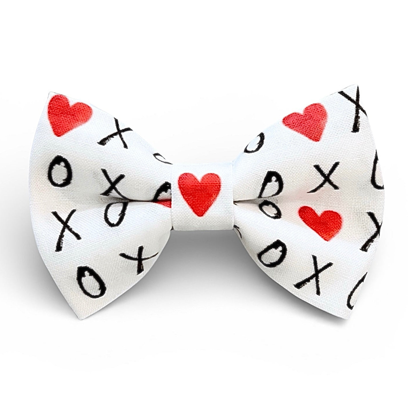 Valentine’s Day Bow Tie- White and Red- XOXO Hearts Against a white background.